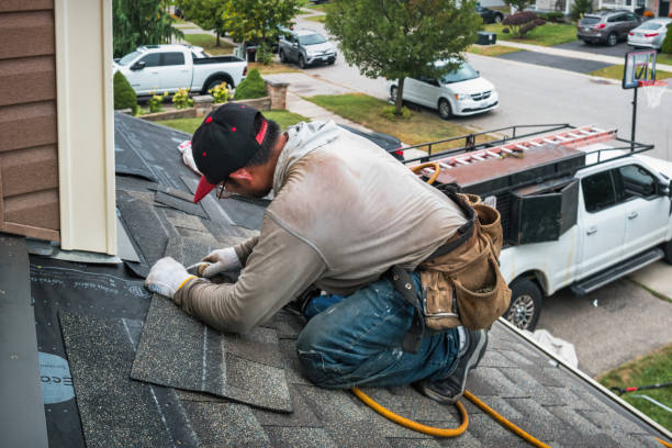 Professional Roof Replacement technician working in Matherville, IL
